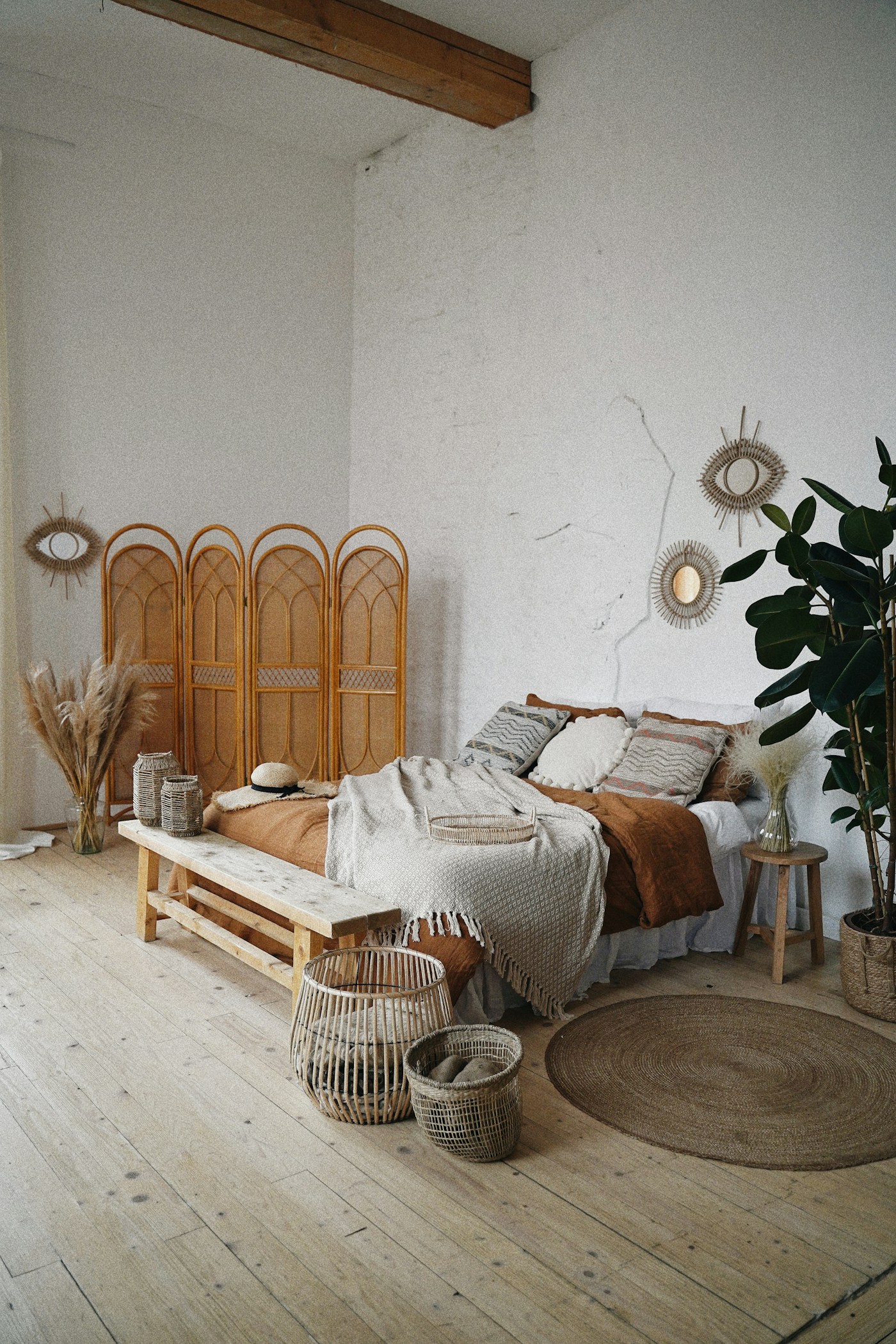 A warm, beautifully-kept residential bedroom — the kind of calm we help our clients come home to